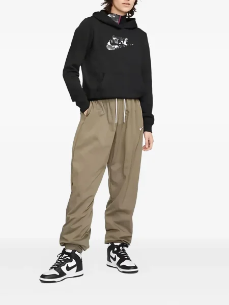 Fleecové běžecké kraťasy Nike s vázáním červené