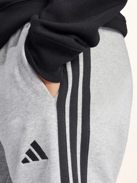 Pruhovaný sportovní kalhoty Adidas šedý