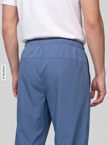 Spodnie dresowe o kroju regular fit z nadruk z logo model FORM' Nike Training niebieskie