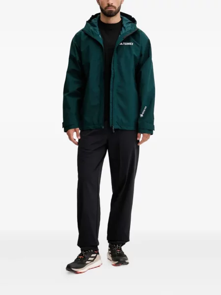 Pruhované kalhoty Adidas s výšivkou na platformě černé