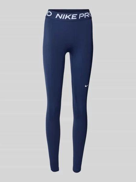 Legginsy typu slim fit z nadrukiem logo Nike Training granatowe
