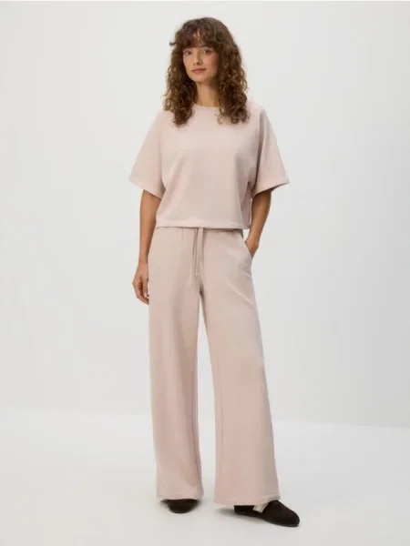 Reserved спортивні штани пастельний рожевий