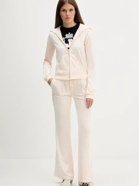 Велюровые однотонные спортивные штаны Juicy Couture с низкой посадкой розовые