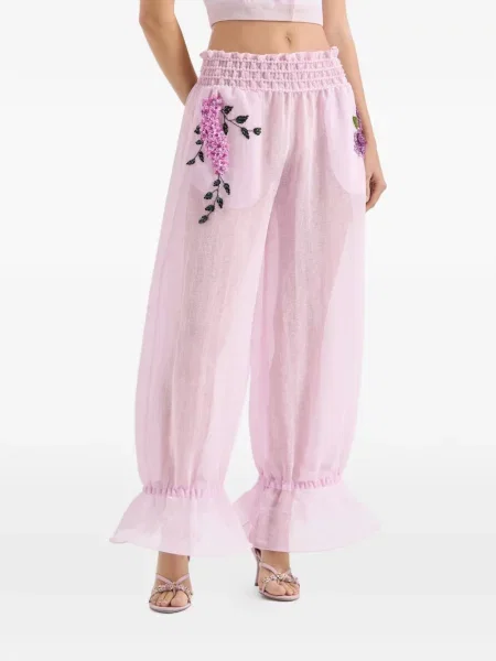 Pantaloni Genny cu model floral cu volane roz