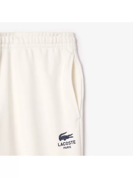 Lacoste Spodnie Dresowe Ze Zwężanymi Nogawkami niebieskie
