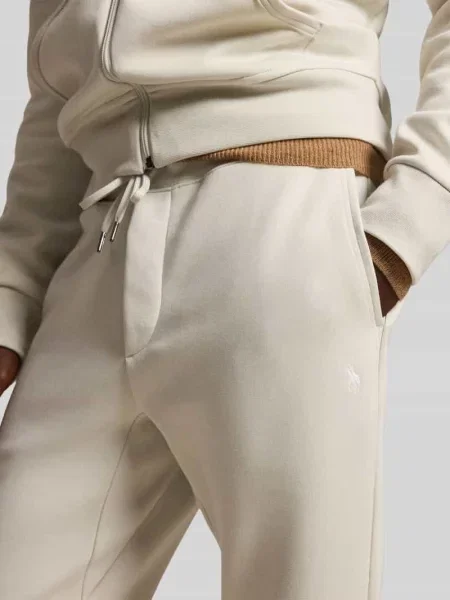 Spodnie dresowe o kroju regular fit z mieszanki bawełny Polo Ralph Lauren beżowe