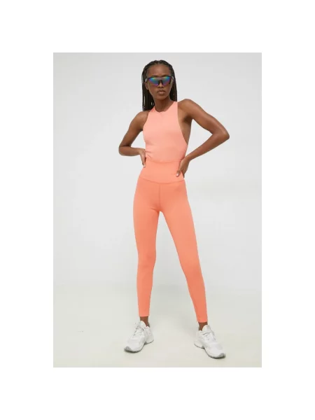 Helly Hansen legginsy gładkie pomarańczowy