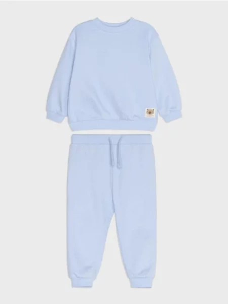 Sinsay komplet: mikina crewneck a jogger kalhoty s nášivkou medvídka modrá