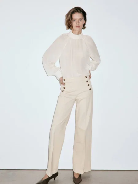 Jeansy wide leg z bocznymi piaskowy Kobieta 44 MANGO