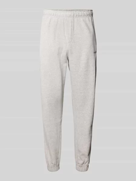 Spodnie dresowe o kroju regular fit z wpuszczanymi model ‘ORVINIO’ Ellesse