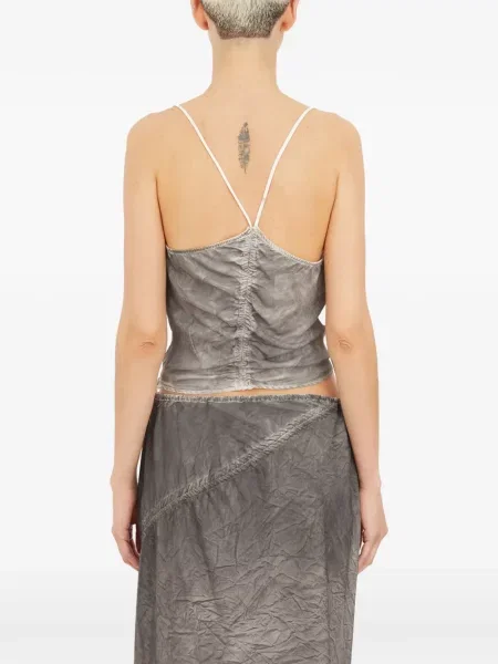 Top Andrea Ya'aqov s volanima siva