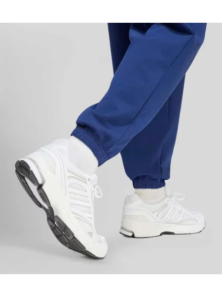 Spodnie dresowe o kroju regular fit z dodatkiem modalu Adidas Sportswear granatowe