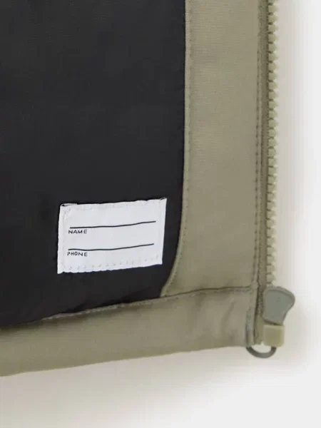 Pikowana kurtka z kapturem khaki Dzieci 7 MANGO KIDS