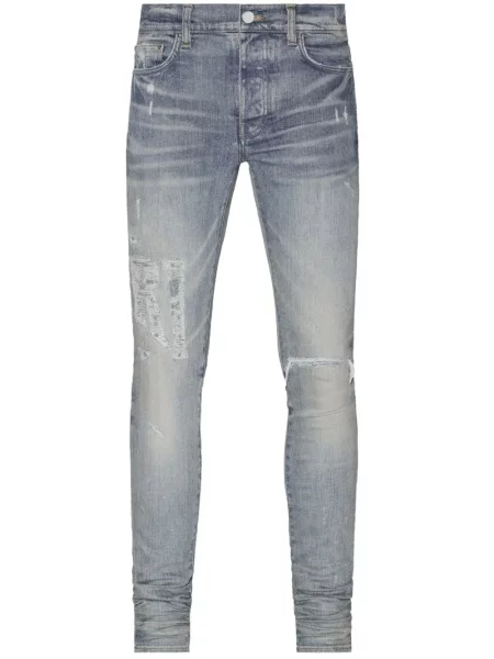 Skinny jeansy skinny Amiri z przetarciami