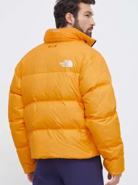 Péřová bunda The North Face zimní žlutá