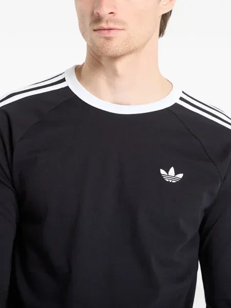 Długie legginsy Adidas z nadrukiem w paski niebieskie