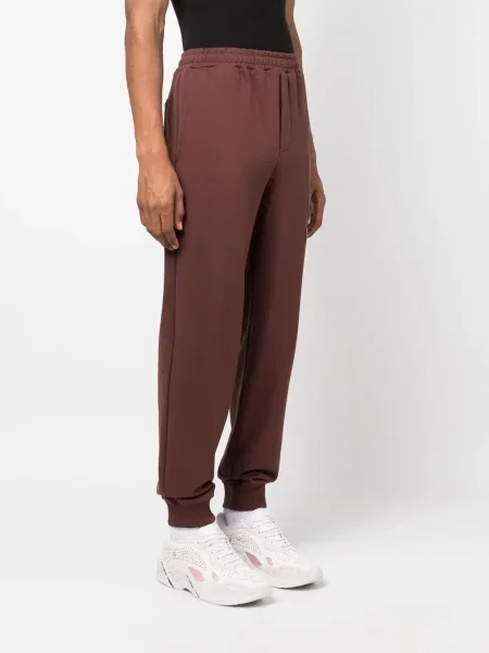 Zúžené kalhoty jogger Helmut Lang hnědé