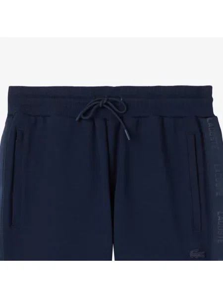 Lacoste Spodnie Dresowe Relaxed Fit granatowe
