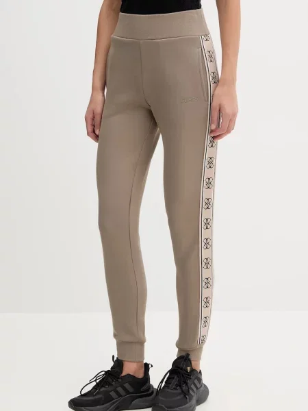 Спортивные штаны Guess с аппликацией розовые