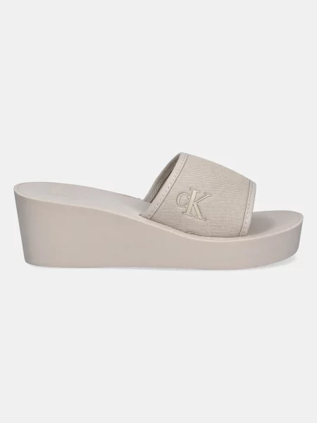 Calvin Klein Jeans klapki BEACH WEDGE SLIDE CANVAS na koturnie beżowy