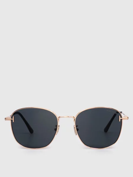 Золотисті сонцезахисні окуляри з гравіюванням логотипа Tom Ford