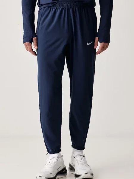 Nike spodnie do biegania Miler Dri-FIT granatowe