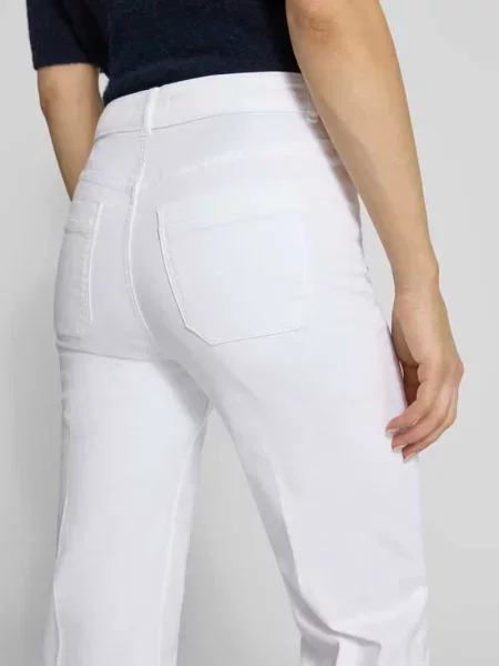 Jeansy w kroju wide fit z kantami Christian Berg Woman białe