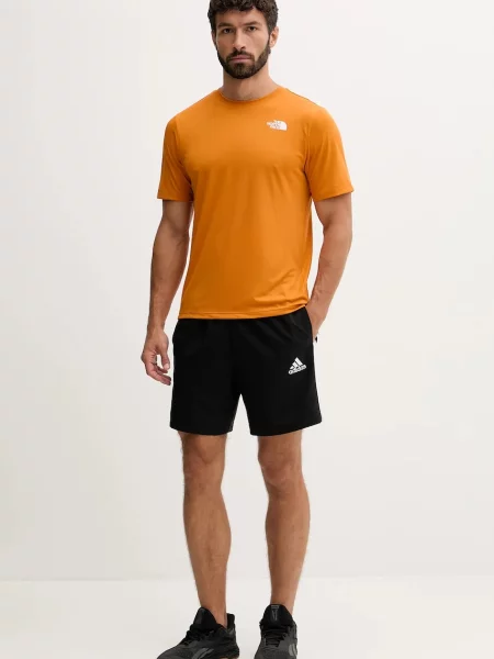 The North Face t-shirt treningowy z nadrukiem pomarańczowy