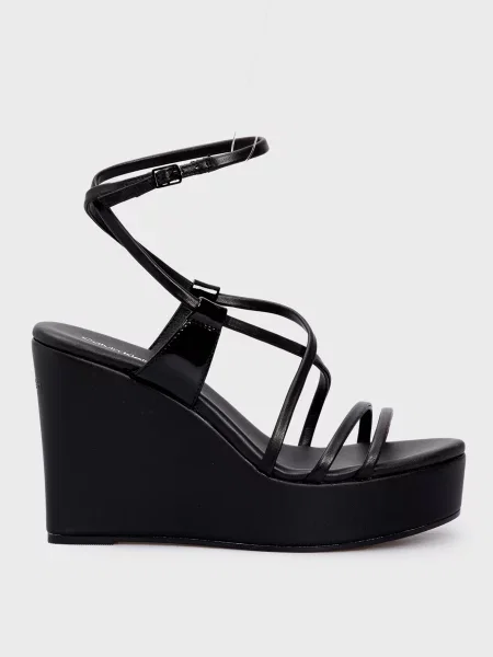 Кожаные босоножки Calvin Klein на танкетке черные