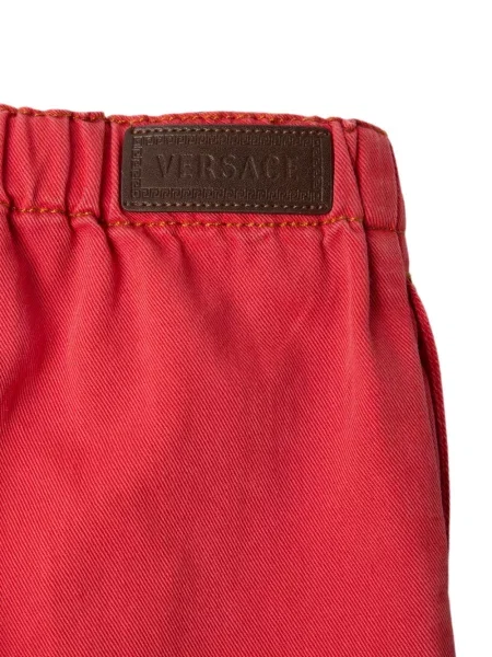 Dětské džíny Versace červené