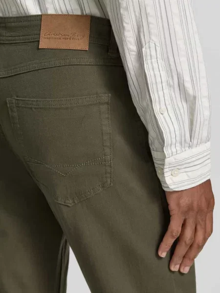 Jeansy o kroju slim fit w 5 kieszeni Christian Berg Men