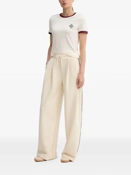 Pantaloni Guess cu dungi alergare