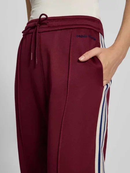Spodnie dresowe o kroju straight fit z paskami w kontrastowym kolorze model ‘Terry’ Calvin Klein Jeans bordowy
