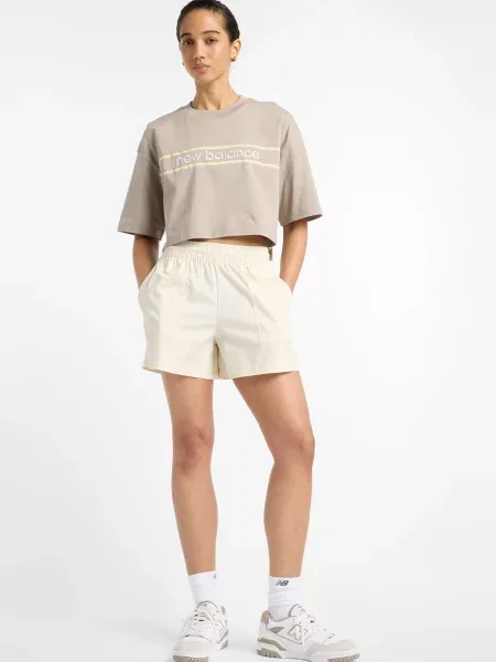 Спортивні шорти New Balance бежеві