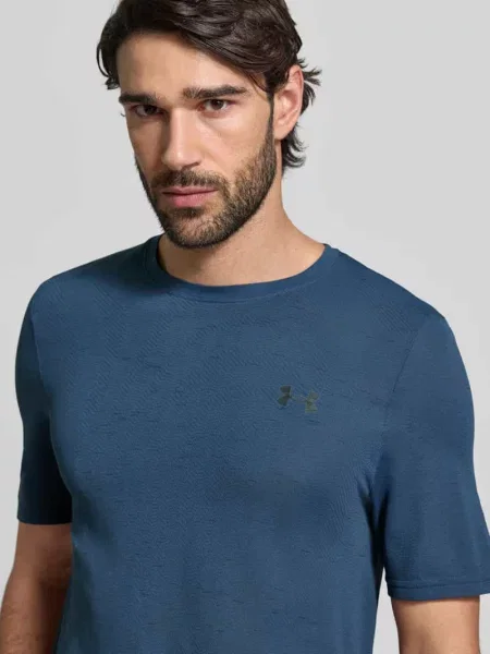 T-shirt o kroju slim fit z nadrukiem z logo model ‘Vanish’ Under Armour granatowa