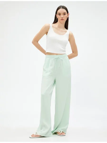 Hlače Koton vezi siva