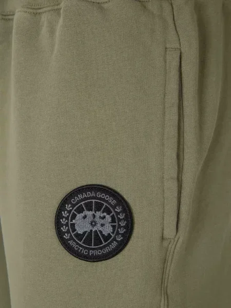 Pantaloni Canada Goose alergare cu autograf verde