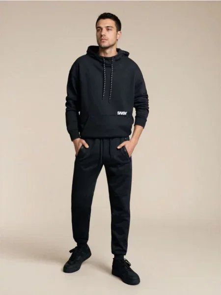 Sinsay Sportovní tepláky černá