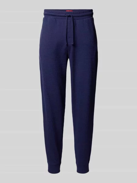 Spodnie dresowe o kroju regular fit z mieszanki bawełny model ‘AUSTIN PANTS’ Hugo granatowe