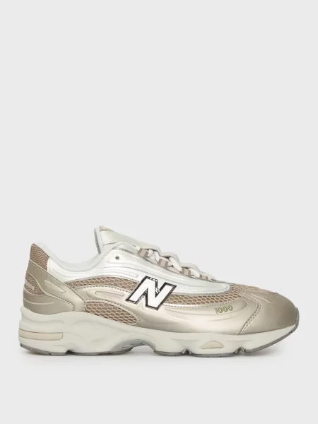 Кроссовки New Balance золотые