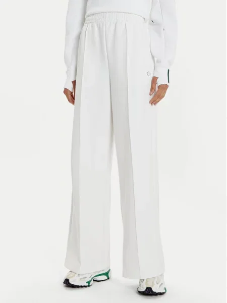Широкие однотонные спортивные штаны Lacoste белые