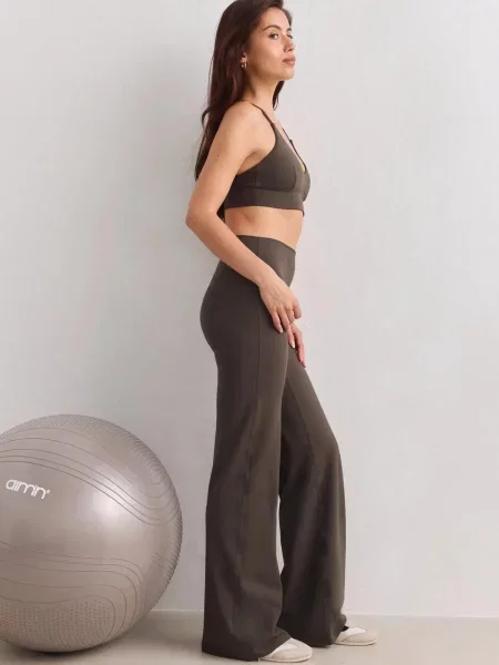 Legginsy z prostą nogawką wysoki stan squat proof Sense ciemnozielone zielone