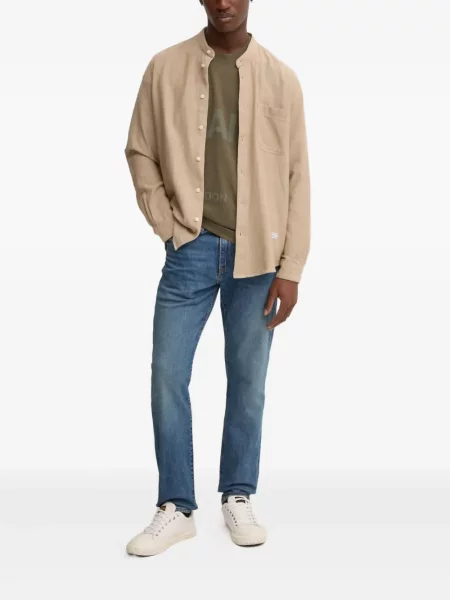 Kožne prugaste traperice Levi's® plava