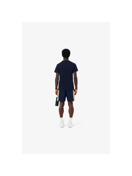 Pantaloni Lacoste albastru