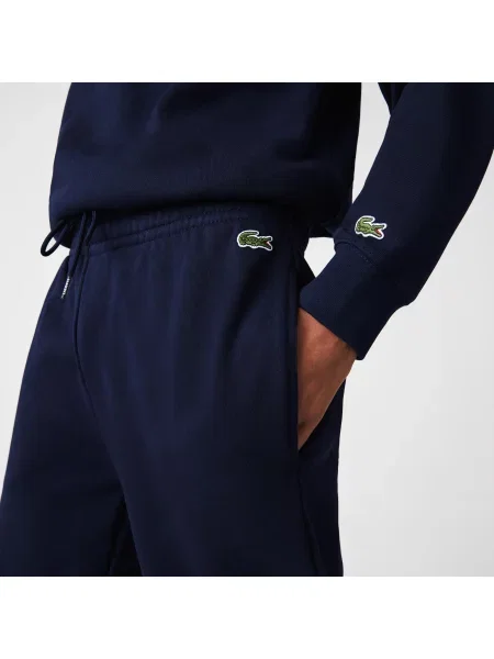 Lacoste Spodnie Dresowe Z Nadrukiem Tapered Fit granatowe