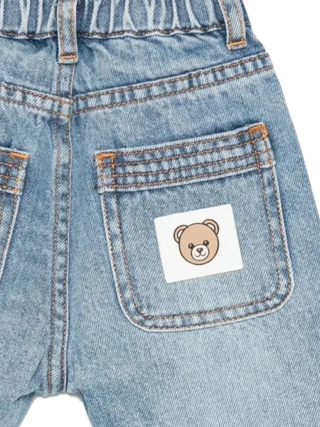 Spodnie dziecięce Moschino niebieskie
