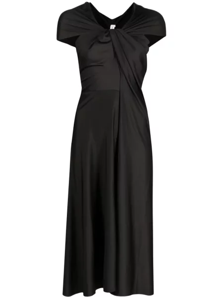 Rochie Victoria Beckham drapată de costum negru