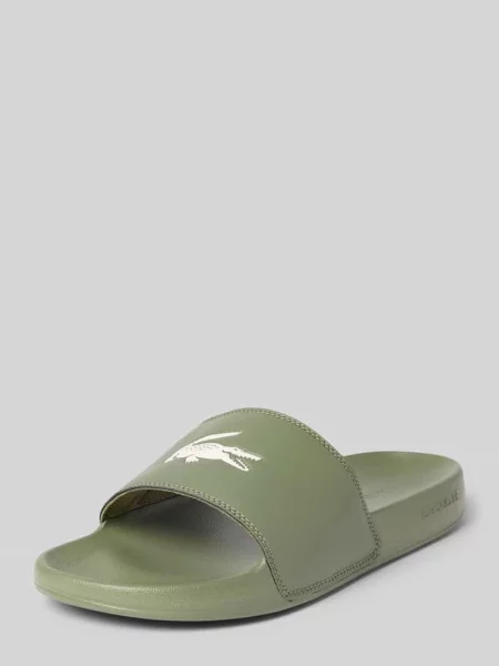Klapki z nadrukiem z logo model SERVE SLIDE Lacoste