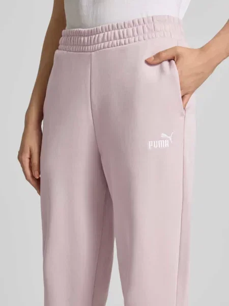 Spodnie dresowe w kroju comfort fit z mieszanka bawełny model No. 1' Puma różowe