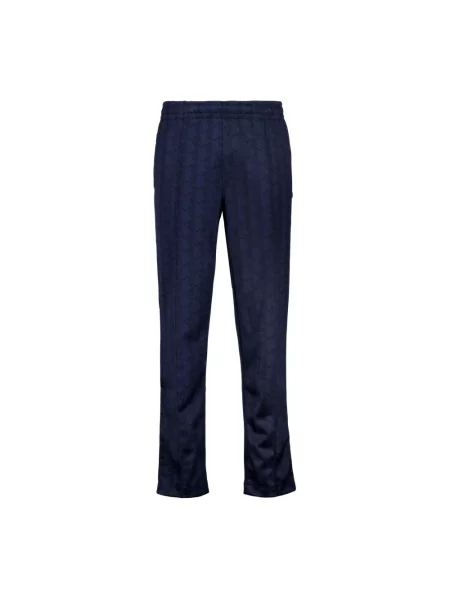 Spodnie dresowe o kroju regular fit z nadrukiem z logo Lacoste niebieskie